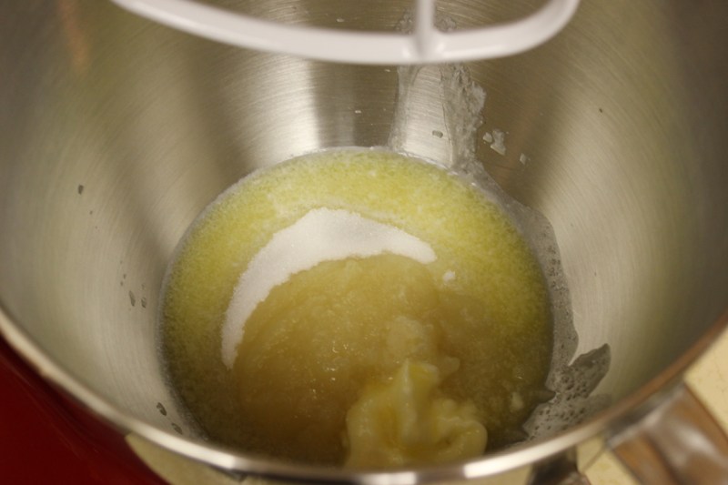 Combining the applesauce, butter and sugar.