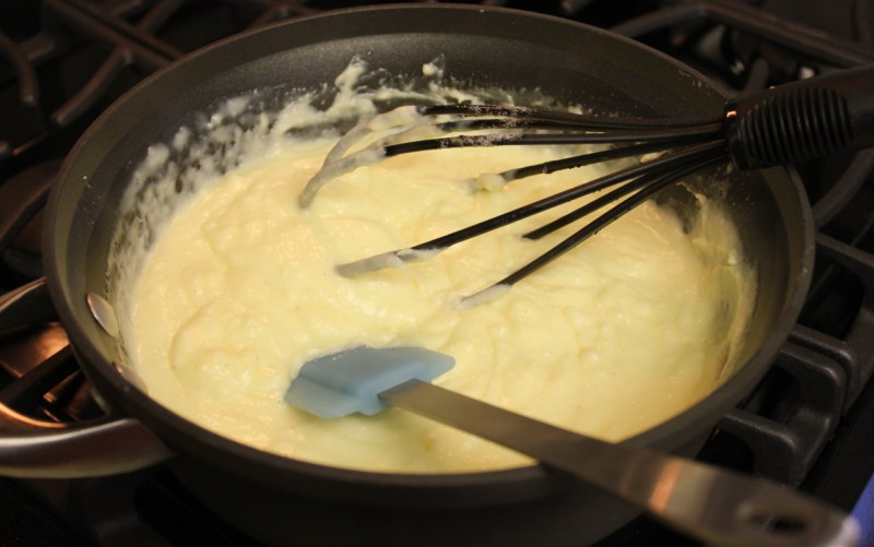 Cooking the cream filling.