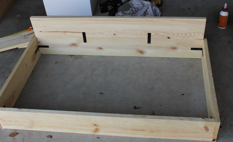 For the corners I used L shaped brackets and for the tall sides I used flat brackets.