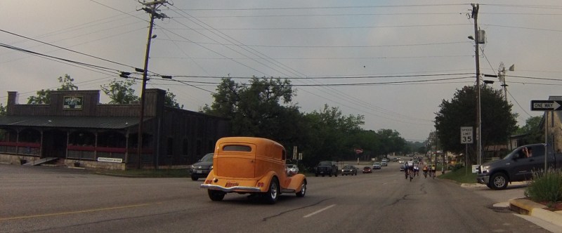Classic cars, rolling down the main street in Blanco right after the ride started.
