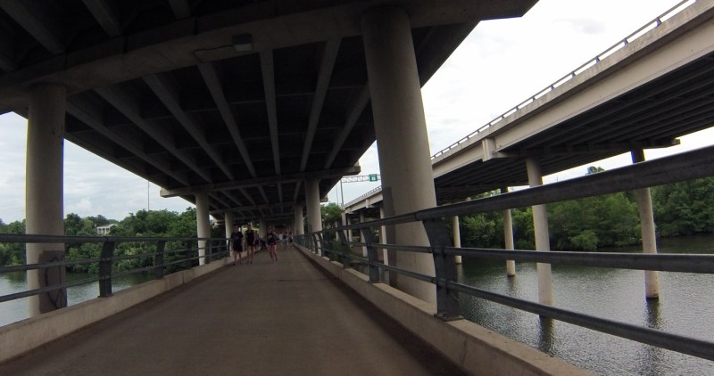 Crossing the pedestrian bridge under Mopac.