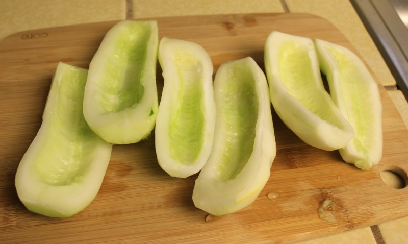 Peel and seed cucumbers
