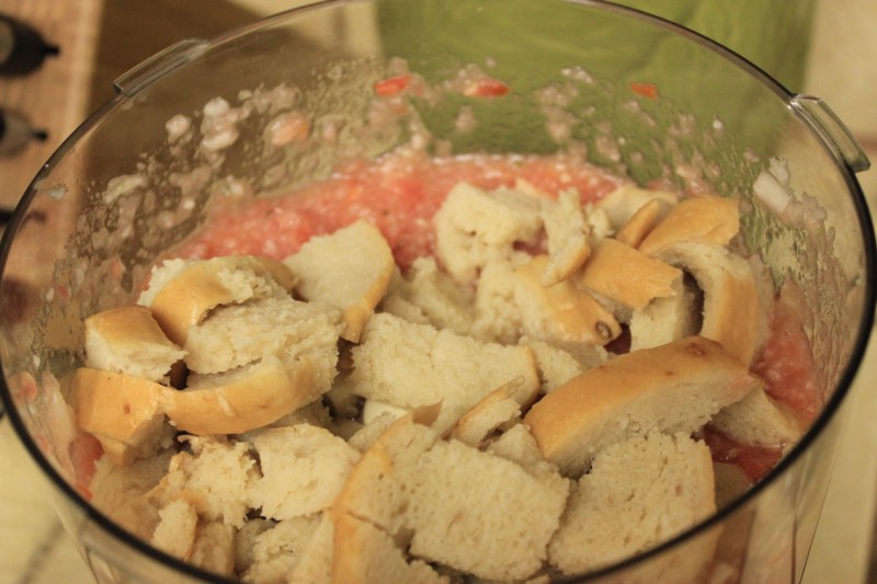 Add bread to food processor and combine.